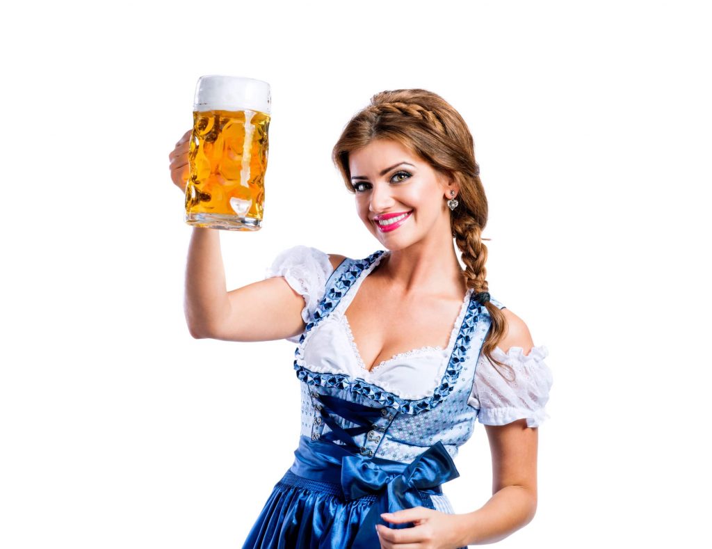German beer maid holding up a full German beer stein.